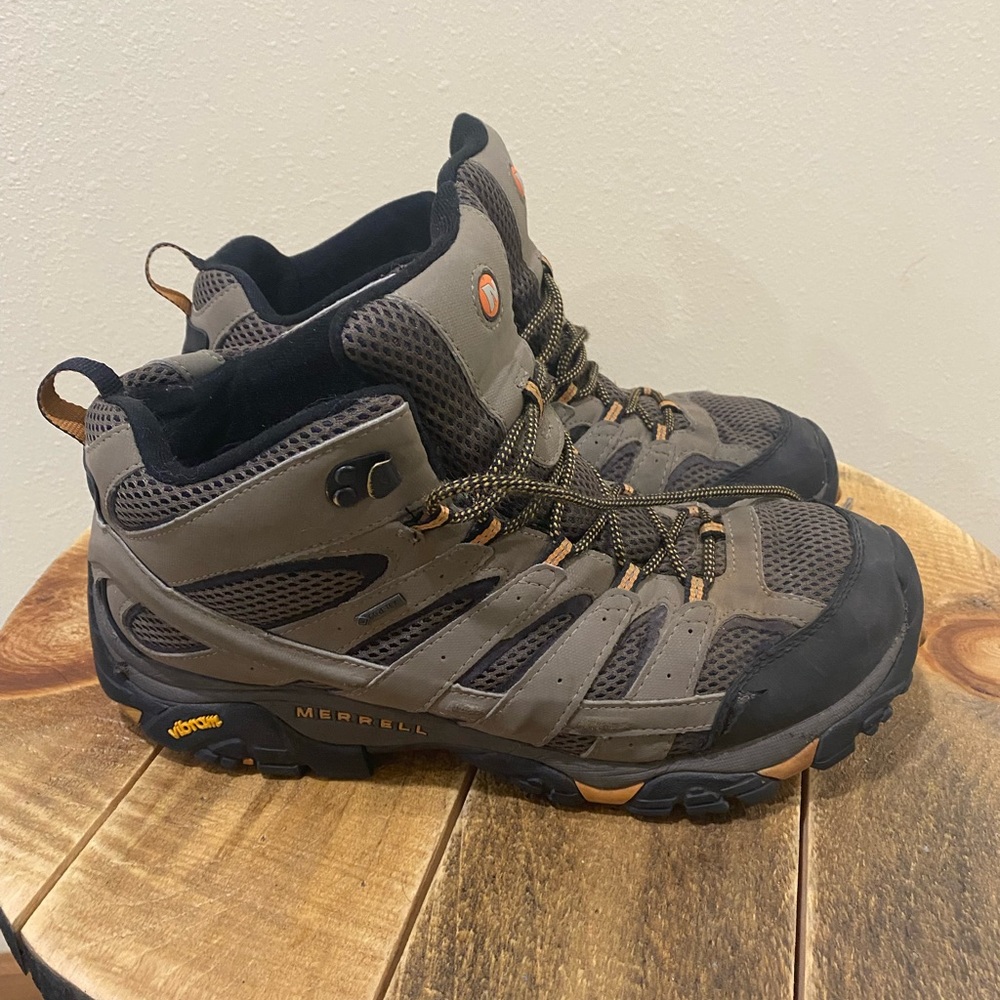 Merrell Moab 2 - Mother of all boots!!  Size 12, excellent soles and traction.